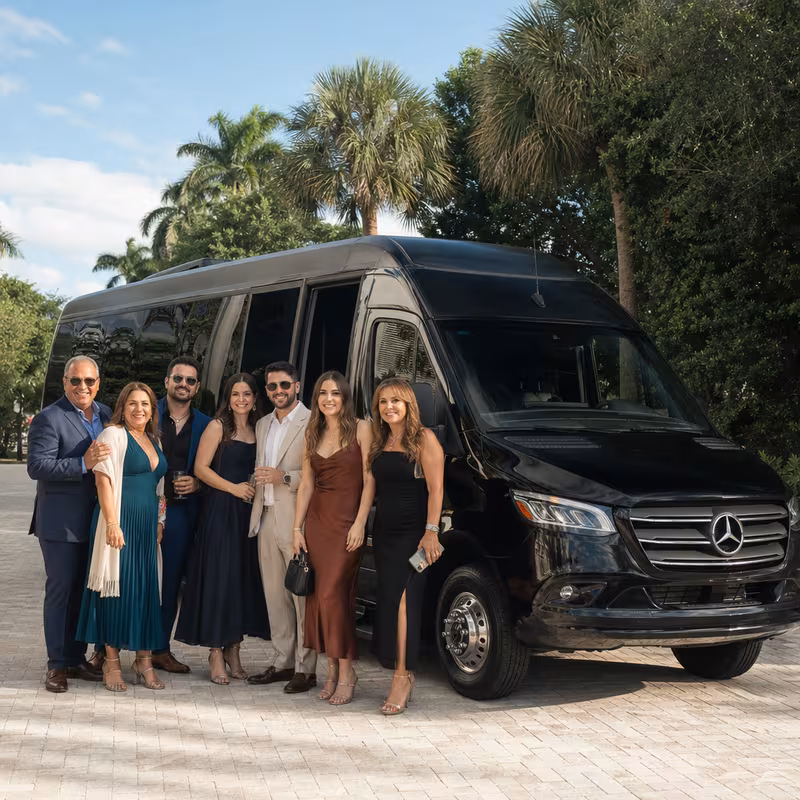 Group beside a Mercedes Sprinter limo from the Fort Lauderdale fleet