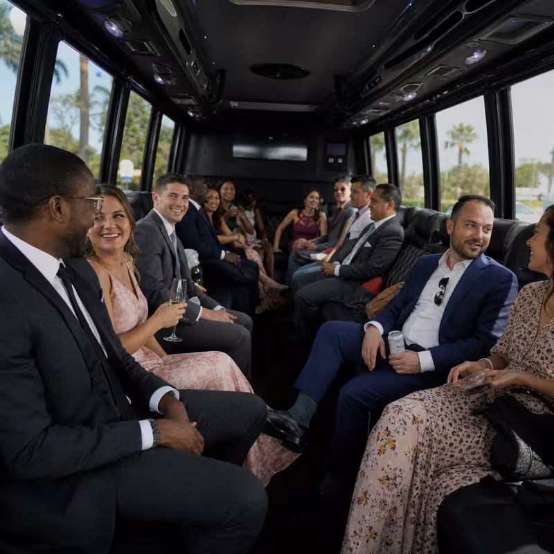 Wedding guests seated inside a Fort Lauderdale party bus