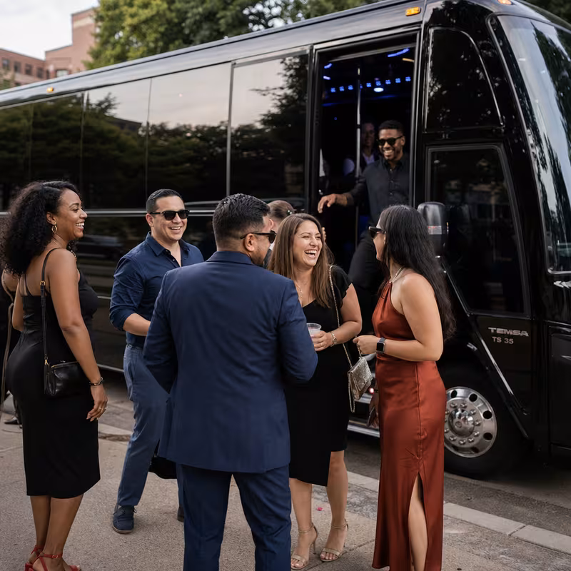 Passengers loading luggage while boarding an Fort Lauderdale group shuttle