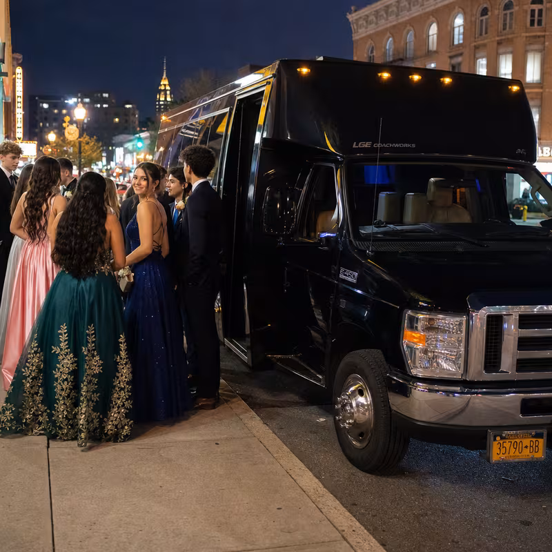 Passengers loading luggage while boarding an Fort Lauderdale group shuttle