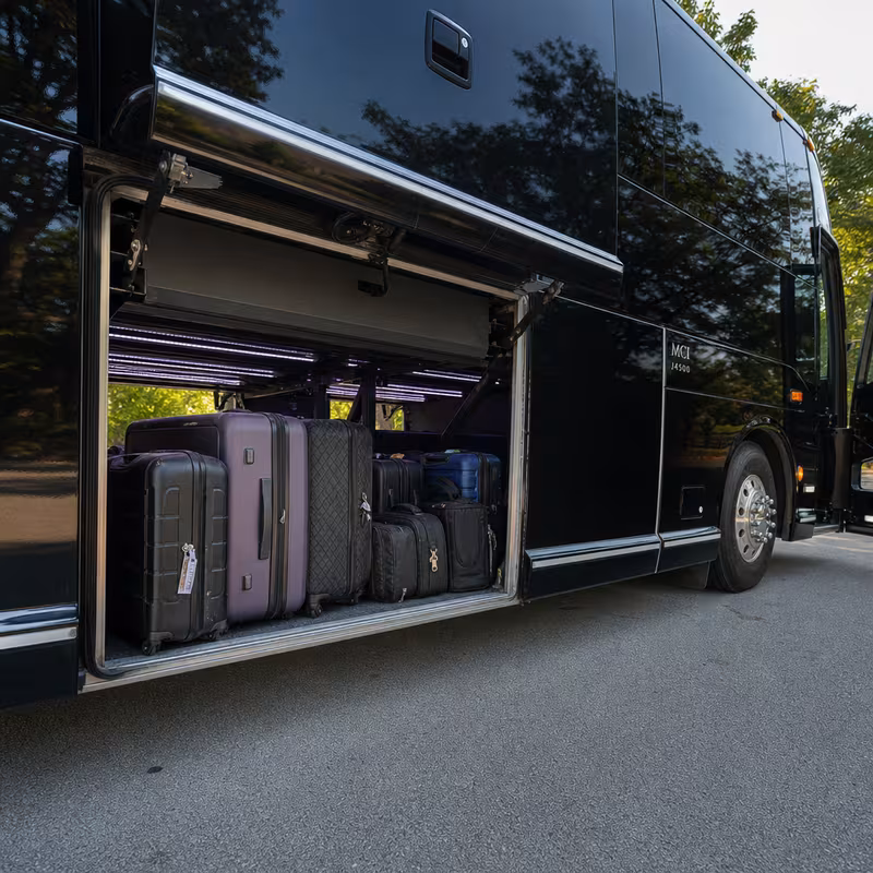 Party bus interior with wraparound leather seating and LED lighting in Fort Lauderdale