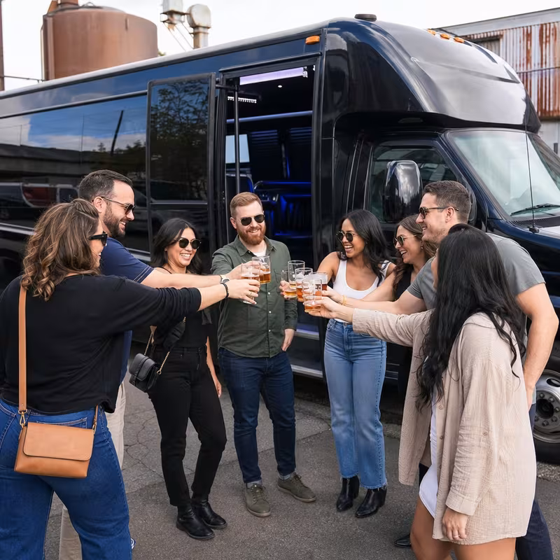 Passengers loading luggage while boarding an Fort Lauderdale group shuttle